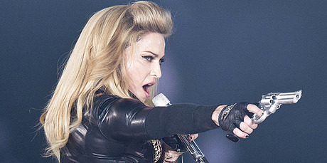 Madonna stepped in to help a fan propose at a concert in Amsterdam. Photo / AP