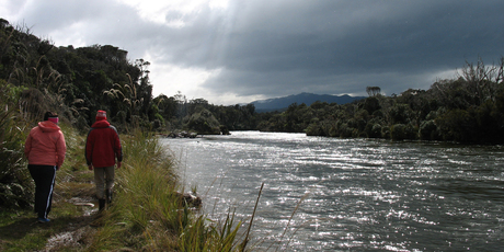 Wairaurahiri River is beautiful even under a brooding sky. Photo / Paul Rush