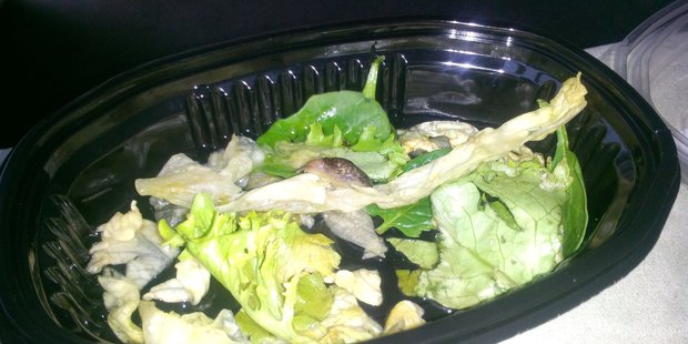 Eric Lin was less than impressed by the contents of his McDonald's salad - even less so when when he was given expired Big Mac vouchers as compensation. Photo / supplied