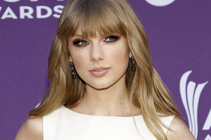 Taylor Swift has topped a rich list for celebrities under 30. Photo / AP