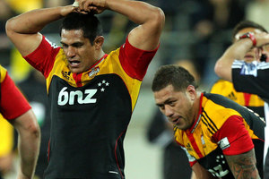 Tanerau Latimer of the Chiefs looks on in disappoinment after the Hurricanes' winning try. Photo / Getty Images.