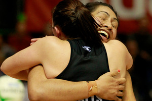 Waikato-Bay of Plenty Magic players Khao Watts and Julianna Naoupu celebrate after their hard fought, extra time victory over the Northern Mystics. Photo / Natalie Slade