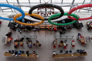 People meet at Heathrow Airport. Photo / AP