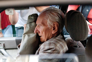 Laszlo Csatary is driven from the Budapest Prosecutor's Office after his arrest yesterday. Picture / AP.