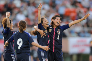 Japan's world champion women's football team has taken exception to flying economy while their male counterparts sat in business class on a flight to Europe for the Olympics. File photo / AP