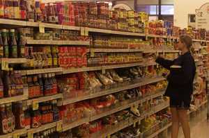 Struggling families are taking short-term loans to pay for food. Photo / Martin Sykes.