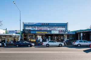 The standalone building is in the Merchants' Quarter.
