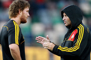 Tawera Kerr-Barlow of the Chiefs talks to assistant coach Wayne Smith during the round three Super Rugby match between the Crusaders and the Chiefs. Photo / Getty images.