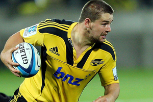 Dane Coles typified the Hurricanes' spirit in a spirited game by hurtling into everything. Photo / Getty Images