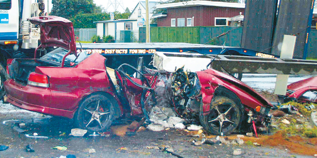 A man was killed and another person injured when their car struck a power pole on Massey Rd, Mangere, early yesterday. Photo / SNPA