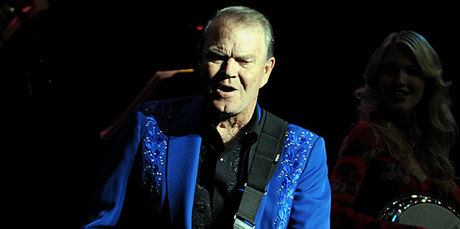 Glen Campbell, seen here performing at the Las Vegas Hotel in June, has cancelled what would have been his last New Zealand shows. Photo / AP