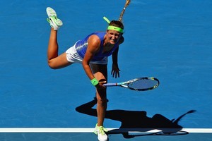 Victoria Azarenka of Belarus serves in her first round match against Heather Watson. Photo / Getty Images