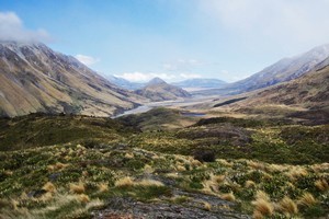 Looking east across rolling tussock hills. Photo / Andrew Stone