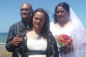 Mary-Lee Huata stands between her mother and her mother's new husband. Photo / Supplied