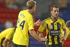 Emmanuel Muscat (R) of the Phoenix is congratulated by teammate Alexander Smith after scoring. Photo / Getty Images