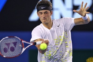 Bernard Tomic of Australia plays a forehand in his second round match against Sam Querrey of the United States. Photo / Getty Images