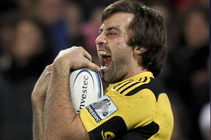 Hurricanes captain Conrad Smith is likely to miss at least the first two round of the Rugby Championship after undergoing surgery on an eye injury. Photo / Getty Images.