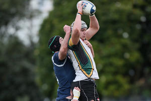 Jack Whetton secures the ball for Grammar Carlton. Photo / Getty Images