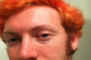 A profile picture taken from an adult dating website that police believe to be James Holmes. Photo / Supplied