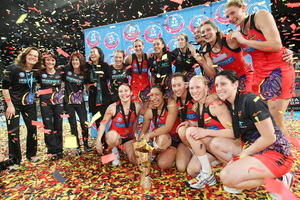 Magic players celebrate after winning the ANZ Championship. Mark McKeown/Musae Studios