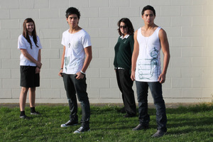 From L-R: Olivia Edington, 14, used family history for the design modelled by Eddie Komiti, while Koia Gray, 19, fused Japanese and Maori motifs for her T-shirt modelled by Vea Komiti. Photo / Supplied