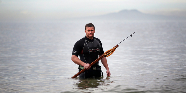 Spearfishing is one of Winston Cowie's many passions. Photo / Doug Sherring