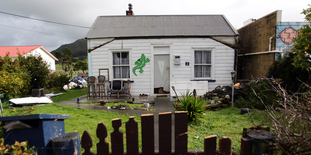 The Hikurangi home partially destroyed by a chainsaw. Photo / Doug Sherring