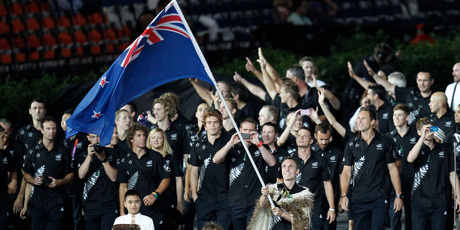 Nick Willis leads the New Zealand team into Olympic Stadium during the spectacular London 2012 Opening Ceremony. Photo / Mark Mitchell