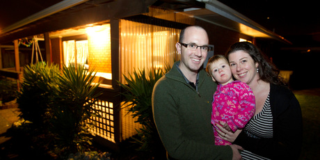 Peter and Caroline Osborne and young Isabelle have a lot more room at their new Papakura home than they would in the city. Photo / Richard Robinson