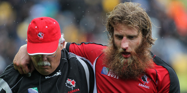 Canadian Adam Kleeberger's Rugby World Cup ended after a clash of heads with All Black Tony Woodcock. Photo / Getty Images.
