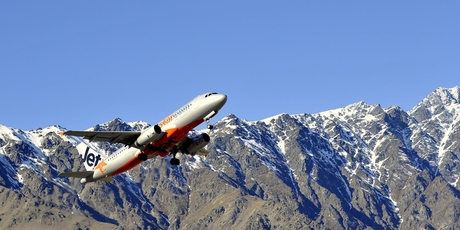 Jetstar A320 taking off from Queenstown airport. The airline says it will offer 120 domestic fares at $12 for every medal the Kiwi team wins. Photo / Supplied