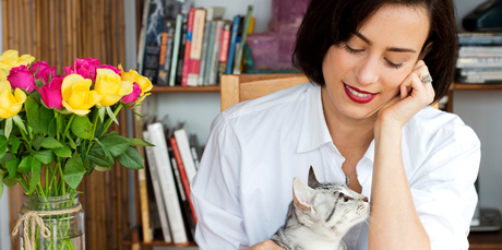 Art director and photographer Calypso Paoli at home with her cat Pepi Le Puss. Photo / Babiche Martens