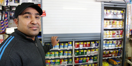 The new tobacco laws mean retailers such as Farrukh Khen at Lenz Superette in Cameron Rd, Tauranga, can't display cigarettes any more. Photo / APN
