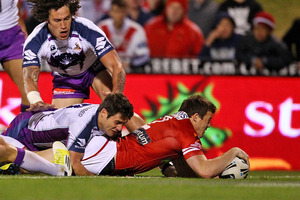 Brett Morris of the Dragons scores. Photo / Getty Images