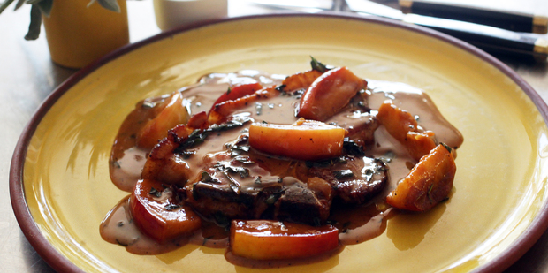 Pork chop with Cox’s apple, sage and cream sauce. Photo / Doug Sherring