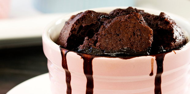 Chocolate self-saucing individual puddings. Photo / Babiche Martens