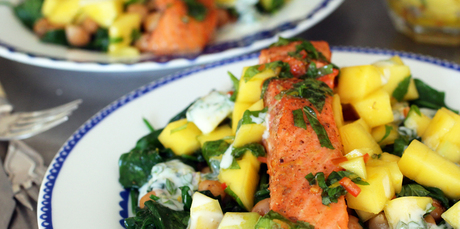 Salmon curry with chickpeas, mango salsa and mint yoghurt. Photo / Doug Sherring