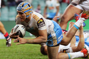 Matt Srama of the Titans dives over to score. Photo / Getty Images