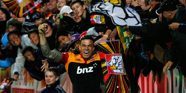 Sonny Bill Williams celebrates his try with the Chiefs fans. Photo / Getty Images