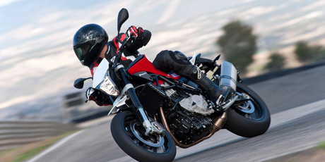 The 900R's height lets the rider see over the traffic, it's agile enough to dart around any obstacle and it's loud. Photo / Supplied