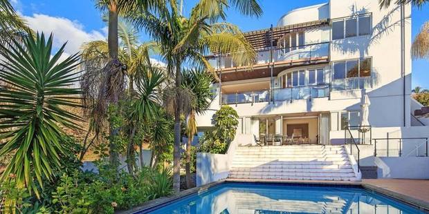 Several renovations around the pool and interior of the Marine Parade house do not meet building standards and the garage has no code of compliance certificate. Photo / Supplied