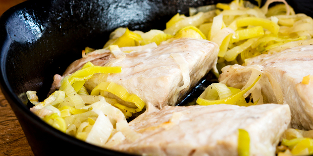 Roast hapuku and leeks with peas and beurre blanc. Photo / Babiche Martens