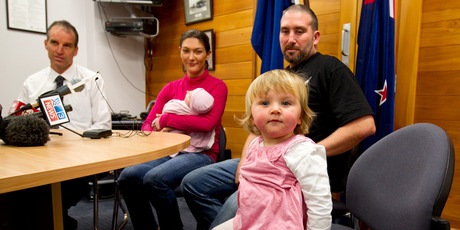 Alyssa Barker with parents Sam and Scott and baby sister Kashine at a police press conference yesterday. Photo / Dean Purcell