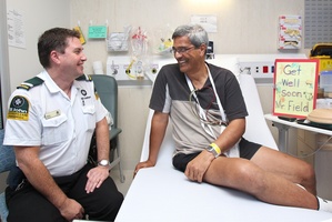 Steven Pasquali from St John visits Brian Field at Tauranga Hospital. Photo / APN