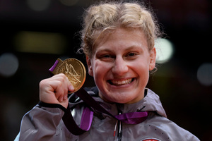 Kayla Harrison with her gold medal. Picture / AP