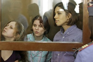 From left, Maria Alekhina, Yekaterina Samutsevich, Nadezhda Tolokonnikova, members of feminist punk group Pussy Riot. Photo / AP