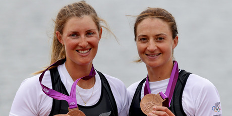 Rebecca Scown and Juliette Haigh are presented with their bronze medals. Source / Brett Phibbs NZ Herald