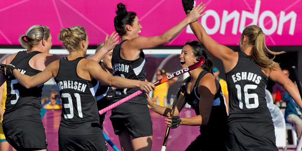 The New Zealand Black Sticks elebrate their winning goal against Australia during their hockey pool match at the London Olympics. Source / Brett Phibbs