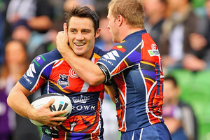 Cooper Cronk celebrates one of two tries he scored against the Panthers. Source / Getty Images