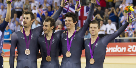New Zealand men's track cyclists, from left, Jesse Sergeant, Aaron Gate, Sam Bewley and Marc Ryan after their bronze medals. Photo / Mark Mitchell